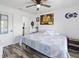 Spacious bedroom with a king-size bed and calming decor at 3270 Hibiscus Dr, Hernando Beach, FL 34607