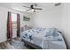 Bedroom with a queen-size bed, window, and ceiling fan at 3270 Hibiscus Dr, Hernando Beach, FL 34607