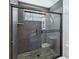 Large walk-in shower with gray tile and glass enclosure at 3270 Hibiscus Dr, Hernando Beach, FL 34607