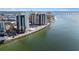 Aerial view of waterfront property and bridge at 440 S Gulfview Blvd # 905, Clearwater Beach, FL 33767