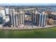 Aerial view of waterfront community with pool at 440 S Gulfview Blvd # 905, Clearwater Beach, FL 33767