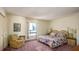 Main bedroom with large bed and city view at 440 S Gulfview Blvd # 905, Clearwater Beach, FL 33767