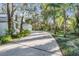 Long driveway leading to a two story house at 5203 Green Forest Ct, Tampa, FL 33647