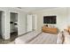 Main bedroom with large bed, dresser, and walk-in closet at 6336 Newtown Cir # 36A1, Tampa, FL 33615