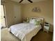 Bright bedroom with a double bed and nightstands at 670 Green Valley Rd # F5, Palm Harbor, FL 34683