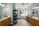 Large bathroom with double vanities and a relaxing soaking tub at 8507 Portage Ave, Tampa, FL 33647