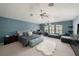 Large main bedroom with sitting area and plenty of natural light at 8507 Portage Ave, Tampa, FL 33647