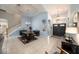Spacious dining area with a wood table and chandelier at 8507 Portage Ave, Tampa, FL 33647