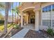 Elegant entryway with columns and a welcoming porch at 8507 Portage Ave, Tampa, FL 33647