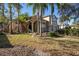 Two-story house exterior with lush landscaping and driveway at 8507 Portage Ave, Tampa, FL 33647