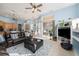 Bright living room with views of kitchen and backyard at 8507 Portage Ave, Tampa, FL 33647