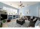 Spacious living room with built-in shelving and a comfortable seating area at 8507 Portage Ave, Tampa, FL 33647
