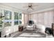 Relaxing sunroom featuring ample natural light and comfortable seating at 8507 Portage Ave, Tampa, FL 33647