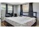 King-size bedroom with a large TV and ample closet space at 10273 109Th Ave, Largo, FL 33773