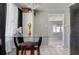 Eat-in kitchen with glass-top table and built-in shelving at 10273 109Th Ave, Largo, FL 33773