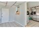 Small laundry room with access to the kitchen area at 10273 109Th Ave, Largo, FL 33773