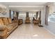 Spacious living room with tiled floors and ample natural light at 10273 109Th Ave, Largo, FL 33773