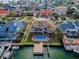 Stunning waterfront home, showcasing a large pool and private dock at 119 8Th E St, Tierra Verde, FL 33715