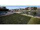 Private backyard with canal access and lush lawn at 119 8Th E St, Tierra Verde, FL 33715