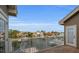 Balcony overlooking a canal with boats and waterfront homes at 119 8Th E St, Tierra Verde, FL 33715