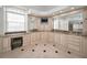 Bathroom with large vanity, granite countertop and TV at 119 8Th E St, Tierra Verde, FL 33715