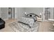 Bright bedroom with a queen-size bed and access to a private bathroom at 119 8Th E St, Tierra Verde, FL 33715