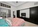 Bedroom with large bed and built-in storage at 119 8Th E St, Tierra Verde, FL 33715