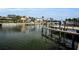 Scenic waterfront view of a canal with private docks and boats at 119 8Th E St, Tierra Verde, FL 33715