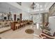 Open floor plan great room with kitchen island and seating at 119 8Th E St, Tierra Verde, FL 33715