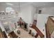 Elegant two-story foyer with chandelier, staircase, and arched windows at 119 8Th E St, Tierra Verde, FL 33715