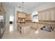 Large kitchen with island and high-end stainless steel appliances at 119 8Th E St, Tierra Verde, FL 33715