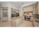 Gourmet kitchen with custom cabinetry and professional range at 119 8Th E St, Tierra Verde, FL 33715