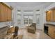 Home office with built-in cabinetry, granite desk, and scenic water views at 119 8Th E St, Tierra Verde, FL 33715