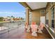 Waterfront patio with seating area and scenic canal views at 119 8Th E St, Tierra Verde, FL 33715