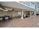 Covered patio with outdoor furniture and canal views at 119 8Th E St, Tierra Verde, FL 33715