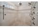Large walk-in shower with multiple shower heads at 119 8Th E St, Tierra Verde, FL 33715