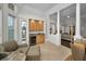 Wet bar with cabinetry and wine cooler, adjacent to bedroom at 119 8Th E St, Tierra Verde, FL 33715