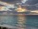 Stunning ocean view at sunrise with dramatic clouds at 1384 S Hillcrest Ave, Clearwater, FL 33756