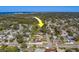 Aerial view of the property and surrounding neighborhood at 1638 St Catherine W Dr, Dunedin, FL 34698