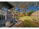 Large backyard with patio, shed, and lush landscaping at 1638 St Catherine W Dr, Dunedin, FL 34698