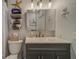 Well-appointed bathroom with vanity, shower/tub, and modern fixtures at 1638 St Catherine W Dr, Dunedin, FL 34698