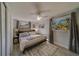 Spacious bedroom with a king-size bed and ample closet space at 1638 St Catherine W Dr, Dunedin, FL 34698