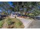 House exterior showcasing landscaping and curb appeal at 1638 St Catherine W Dr, Dunedin, FL 34698