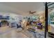 Open concept living room and kitchen with modern finishes, and stylish decor at 1638 St Catherine W Dr, Dunedin, FL 34698