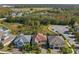 An aerial view of the home and surrounding community including conservation areas at 17907 Woodland View Dr, Lutz, FL 33548