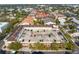 Aerial view showcasing a large parking area and surrounding buildings in a residential complex at 2440 W Horatio St # 1030, Tampa, FL 33609