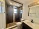 Modern bathroom with a stylish tiled shower, new vanity, and contemporary fixtures at 3211 S Ferdinand Ave, Tampa, FL 33629