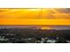 Breathtaking sunset over the bay, with a bridge in the distance and lush surroundings at 3401 Bayshore Blvd # 1904, Tampa, FL 33629