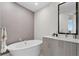 Spa-like bathroom with a freestanding tub and modern vanity at 3401 Bayshore Blvd # 1904, Tampa, FL 33629