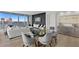 Bright dining area with glass table and modern chairs, offering city views at 3401 Bayshore Blvd # 1904, Tampa, FL 33629